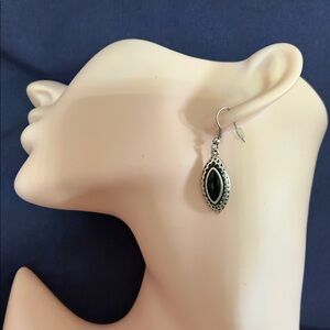 Rhinestone and silver tone earrings​